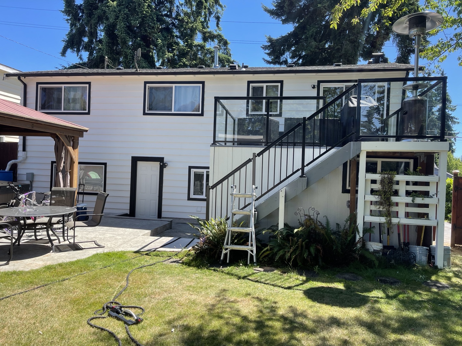 Exterior back elevation white and black trim